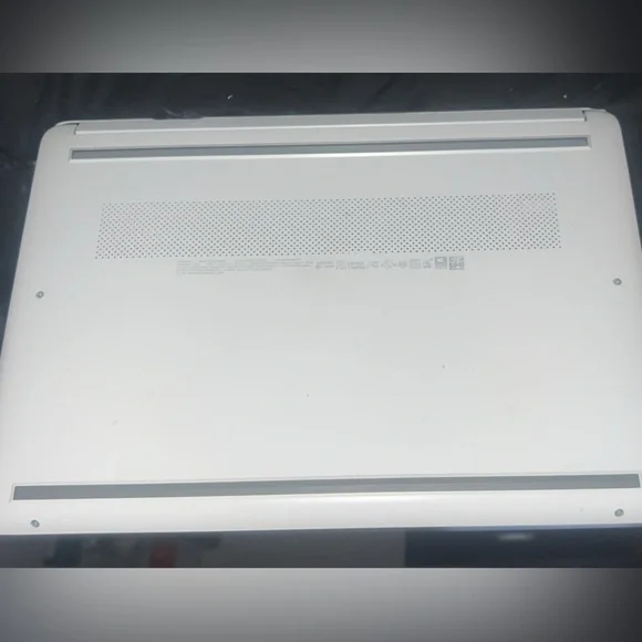 HP Silver Laptop with Black and Red Accessories